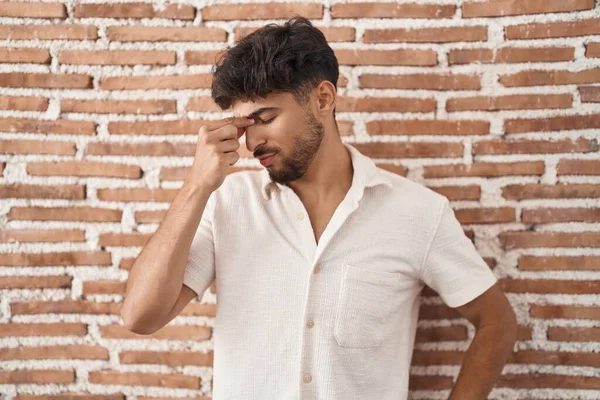 Arab Man Beard Standing Bricks Wall Background Tired Rubbing Nose — Fotografia de Stock
