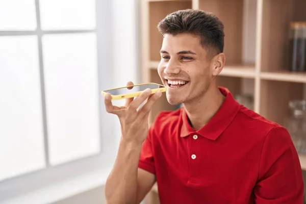 Young Hispanic Man Using Laptop Talking Smartphone Home — Stock Photo, Image