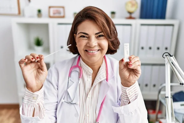 Middle Age Hispanic Doctor Woman Holding Coronavirus Infection Nasal Test — Stock Photo, Image