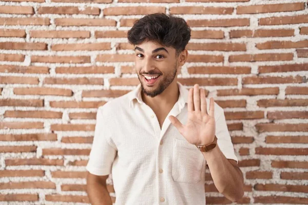 Arab Man Beard Standing Bricks Wall Background Waiving Saying Hello — Foto Stock