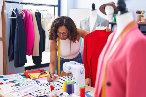 Middle Age Woman Tailor Holding Shirt Writing Notebook Clothing Factory — Stock Photo, Image