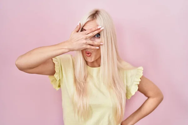 Caucasian Woman Standing Pink Background Peeking Shock Covering Face Eyes — Fotografia de Stock