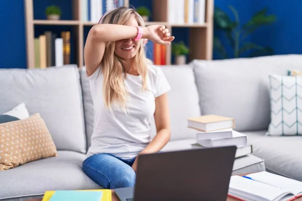 Young Blonde Woman Studying Using Computer Laptop Home Covering Eyes — Stockfoto