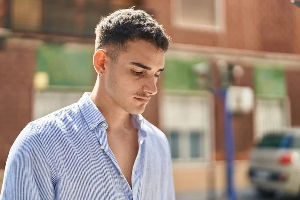 Young Hispanic Man Relaxed Expression Standing Street — Stockfoto