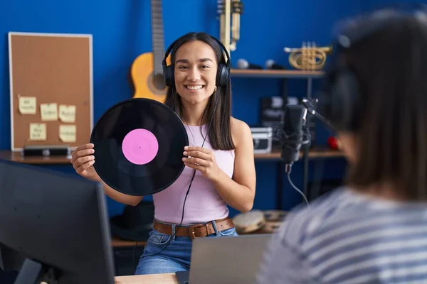 Two Women Musicians Listening Music Holding Vinyl Disc Music Studio — ストック写真