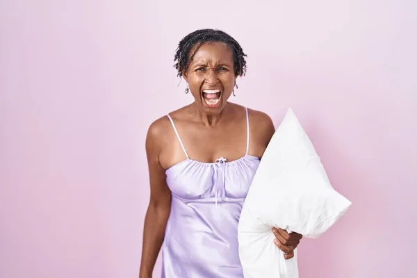 African Woman Dreadlocks Wearing Pajama Hugging Pillow Angry Mad Screaming — Stockfoto