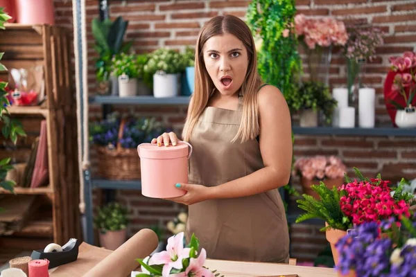 Young Blonde Woman Working Florist Shop Afraid Shocked Surprise Amazed — Stockfoto