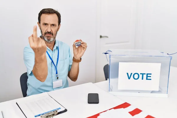 Middle Age Man Beard Sitting Ballot Holding Vote Badge Showing —  Fotos de Stock