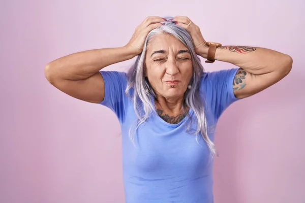 Middle Age Woman Tattoos Standing Pink Background Suffering Headache Desperate — Stock Photo, Image