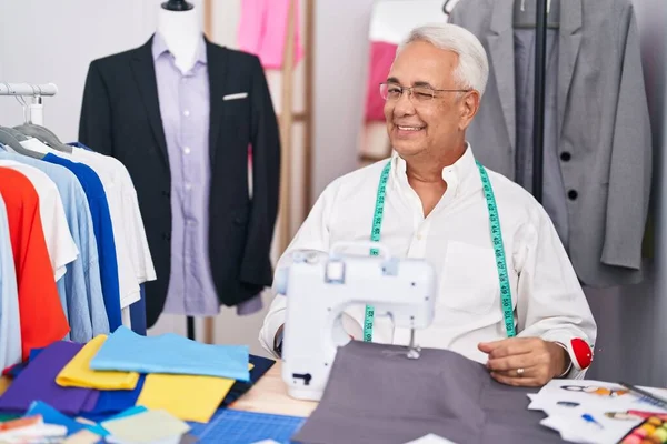 Middle Age Man Grey Hair Dressmaker Using Sewing Machine Winking — Stock Photo, Image