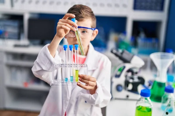 Blond Child Wearing Scientist Uniform Holding Test Tubes Laboratory — Zdjęcie stockowe