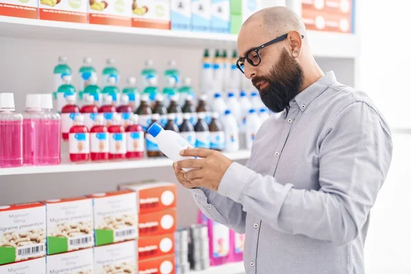 Young Bald Man Customer Holding Medication Bottle Pharmacy — Stockfoto