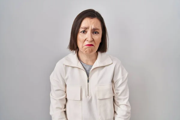 Middle Age Hispanic Woman Standing Isolated Background Depressed Worry Distress — Stockfoto
