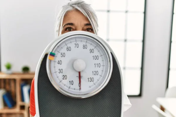 Middle Age Grey Haired Woman Covering Face Weighing Machine Home — Foto Stock