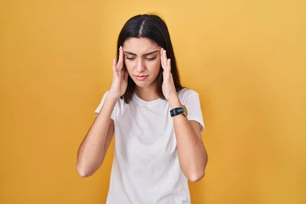 Young Beautiful Woman Standing Yellow Background Hand Head Headache Because — Foto de Stock