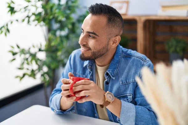 Young Hispanic Man Drinking Coffee Sitting Table Home — Stock Photo, Image