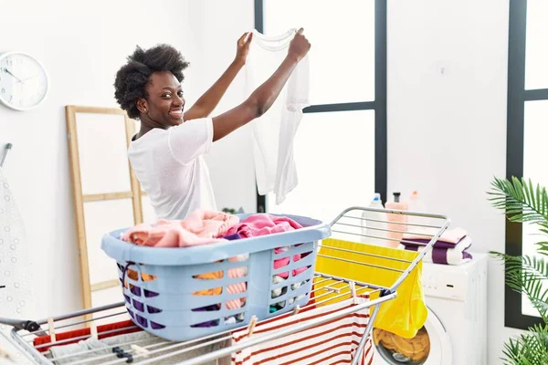 Young African American Woman Doing Laundry Looking Clothes Laundry — Stockfoto