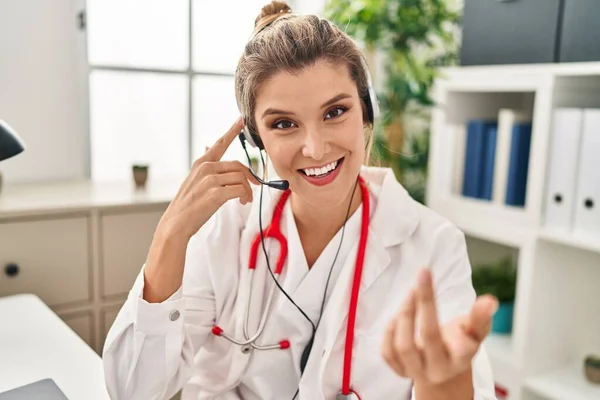 Young Blonde Woman Wearing Doctor Uniform Having Teleconsultation Clinic — 스톡 사진