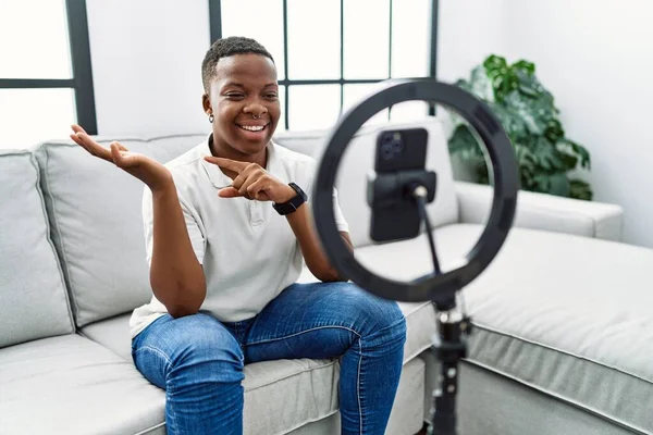 Young African Man Recording Vlog Tutorial Smartphone Home Amazed Smiling — Foto Stock