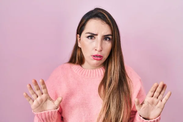Young Hispanic Woman Standing Pink Background Moving Away Hands Palms — Foto de Stock