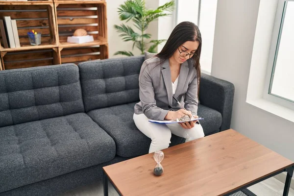 Young Beautiful Hispanic Woman Psychologist Writing Document Psychology Clinic — Stock fotografie