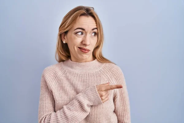 Hispanic Woman Standing Blue Background Pointing Aside Worried Nervous Forefinger — Stock Photo, Image