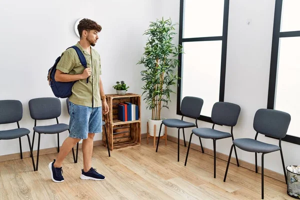 Young Arab Man Wearing Backpack Standing Waiting Room — Fotografia de Stock