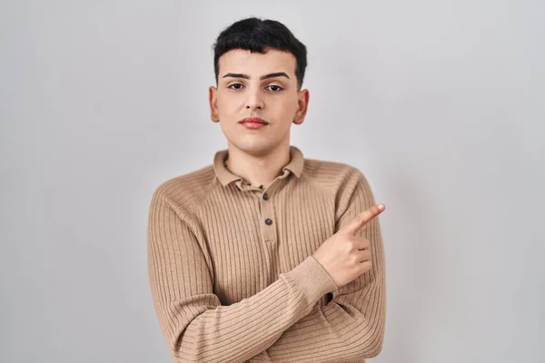 Non Binary Person Standing Isolated Background Pointing Hand Finger Side — Stock Photo, Image