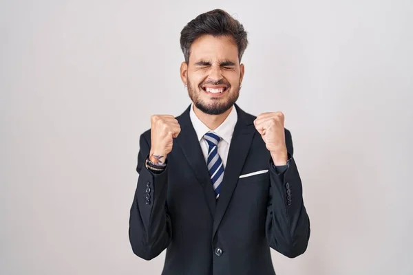 Young Hispanic Man Tattoos Wearing Business Suit Tie Excited Success — Stock Photo, Image