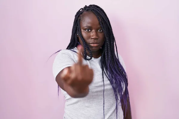 Young African Woman Standing Pink Background Showing Middle Finger Impolite — стоковое фото