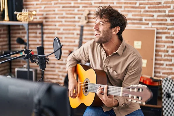 Young Man Musician Singing Song Playing Classical Guitar Music Studio — Foto Stock