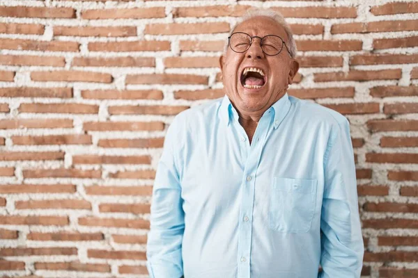 Senior Man Grey Hair Standing Bricks Wall Angry Mad Screaming — Stock Photo, Image
