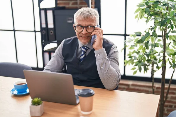 Middle Age Grey Haired Man Business Worker Using Laptop Talking — Stock Photo, Image