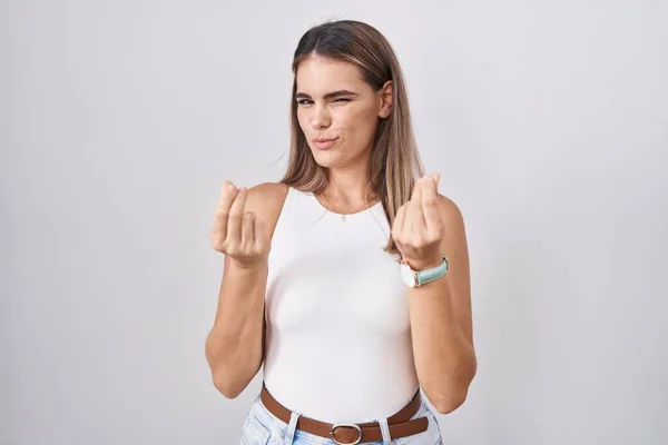 Hispanic Young Woman Standing White Background Doing Money Gesture Hands — Zdjęcie stockowe