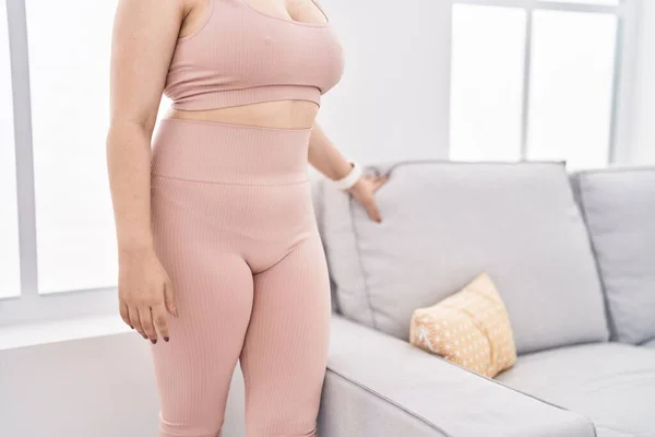 Young Caucasian Woman Wearing Sportswear Standing Home — Stockfoto