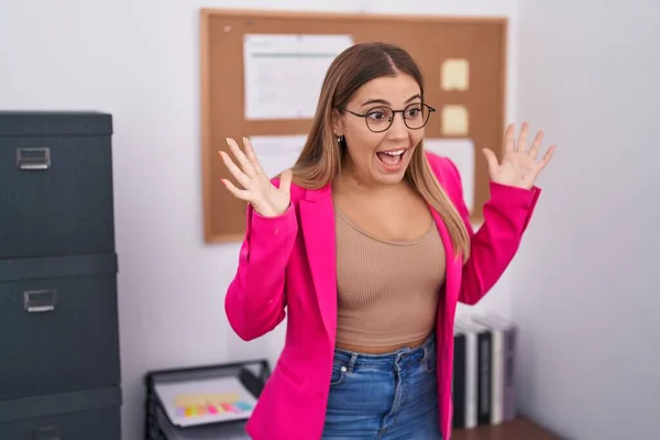 Young Blonde Woman Standing Office Celebrating Crazy Amazed Success Arms — Stockfoto