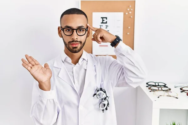 African American Optician Man Standing Eyesight Test Confused Annoyed Open — Stockfoto