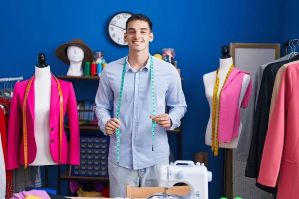 Young Hispanic Man Tailor Smiling Confident Standing Sewing Studio — Stock Fotó