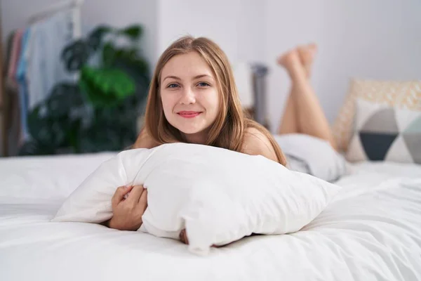 Young Caucasian Woman Hugging Pillow Lying Bed Bedroom — Stockfoto