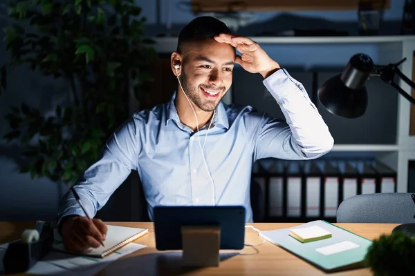 Young Hispanic Man Working Office Night Very Happy Smiling Looking — Stok fotoğraf