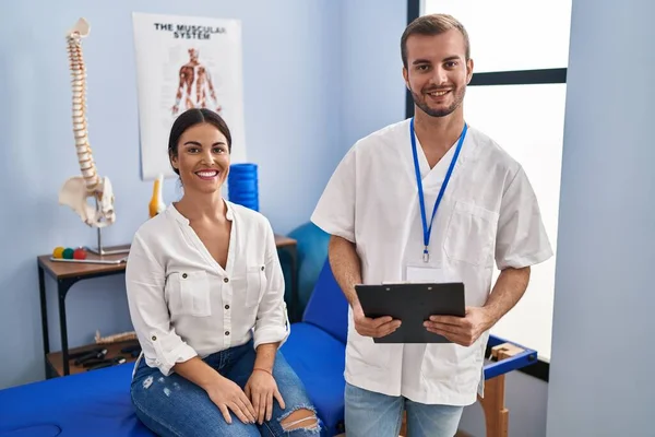 Young Hispanic Woman Physiotherapist Appointment Happy Cool Smile Face Lucky — Stockfoto