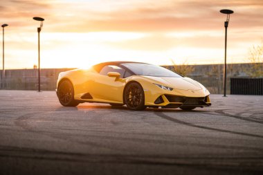 Wroclaw, Poland - May 6, 2020: Yellow parked lamborghini Huracan. It is a dream car with beautiful italian design. 