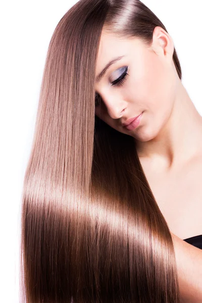 Frau mit gesunden langen Haaren Stockfoto