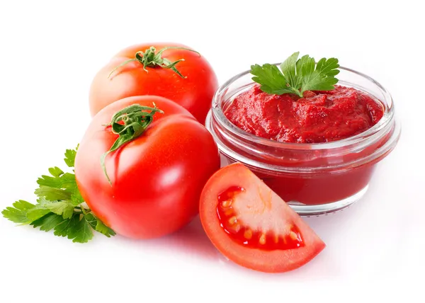 Frische Tomaten mit Paste Stockbild