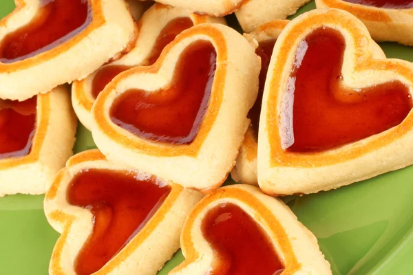 Heart shaped cherry jam cookies — Stock Photo, Image