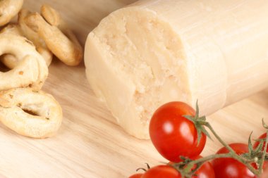 Parmesan cheese, cherry tomatoes and taralli clipart