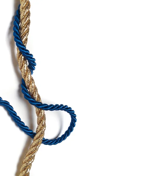 Золота Мотузка Сплетена Синьою Шовковою Мотузкою Білий Фон Вертикальний — стокове фото