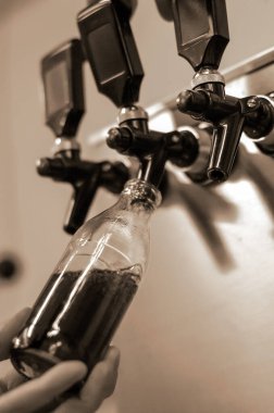 tapping of soft drink for a taste test in the beverage industry