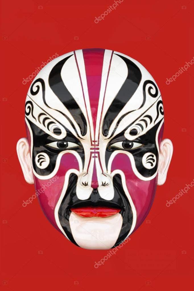 Chineese opera mask on the black background