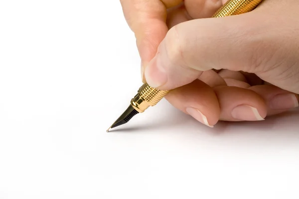 Kugelschreiber in Frauenhand lizenzfreie Stockfotos